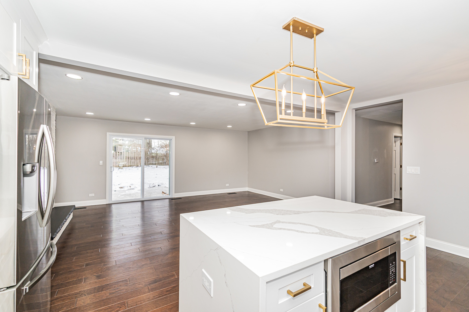 1913 Martingale Road Wheaton, IL 60187 - Photo 6 of 36 a kitchen with a stove and a chandelier