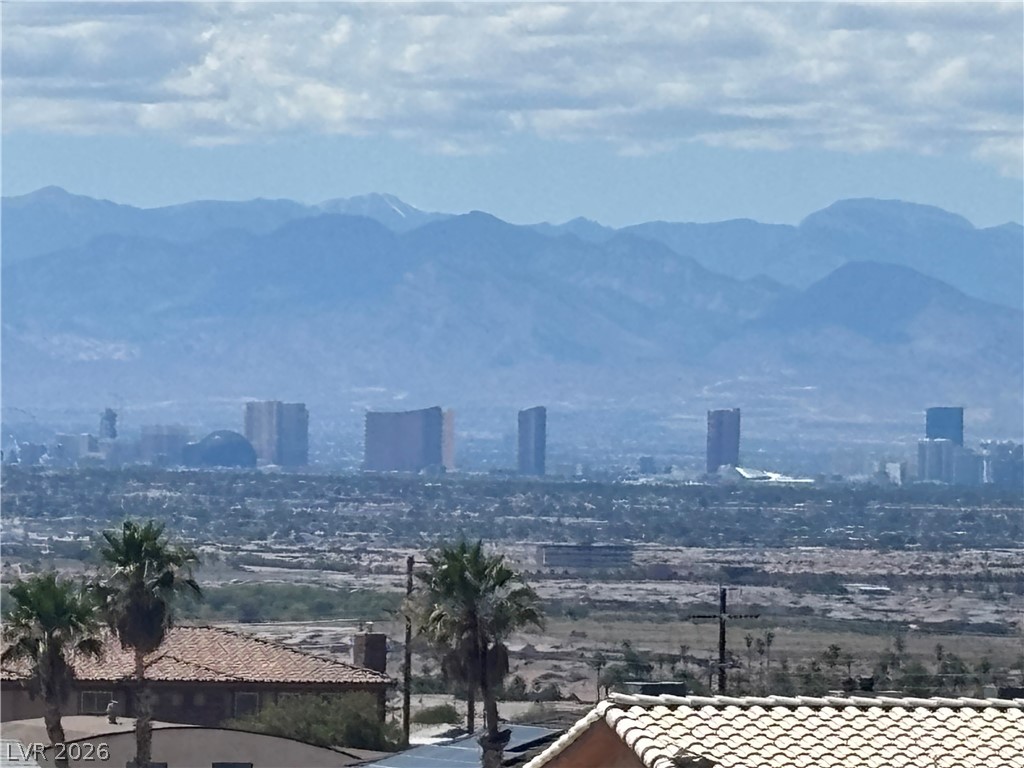 628 Hull Street Henderson, NV 89015 - Photo 7 of 9 Panoramic mountain and city skyline views offer an inspiring backdrop from this property.
