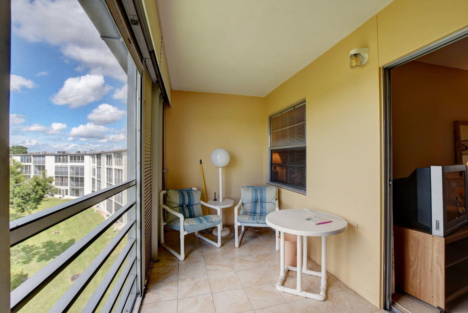 4015 Rexford Drive, Unit 4015 Boca Raton, FL 33434 - Photo 15 of 29 Screened Patio W/Pull Downs