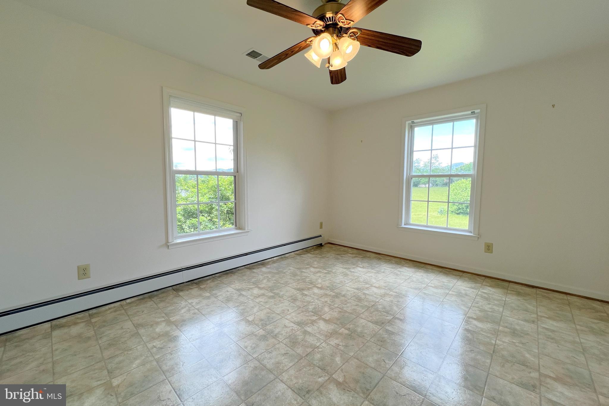 3542 Slate Mills Road Sperryville, VA 22740 - Photo 15 of 31 Bedroom 3 on main floor with Blue Ridge view