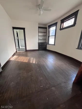 a view of empty room with windows