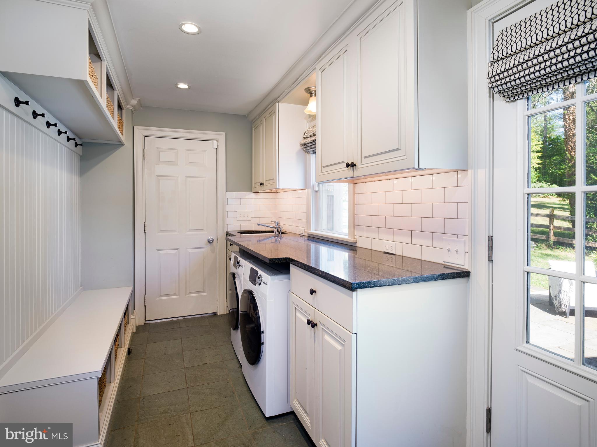 813 Hunt Road Newtown Square, PA 19073 - Photo 24 of 49 a kitchen with granite countertop a sink and cabinets