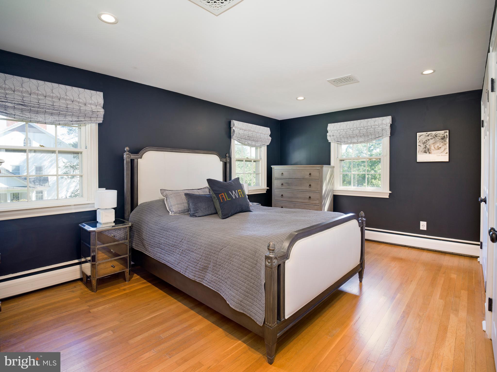 813 Hunt Road Newtown Square, PA 19073 - Photo 27 of 49 a bedroom with a bed and window