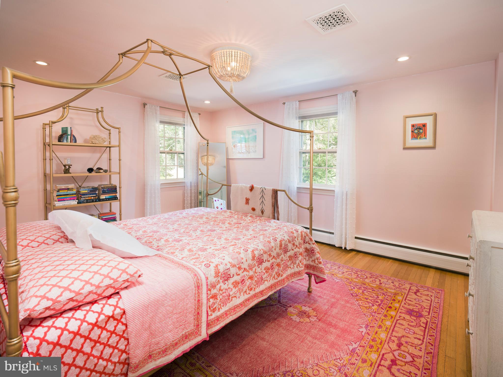 813 Hunt Road Newtown Square, PA 19073 - Photo 34 of 49 a bedroom with a bed dresser and a large window