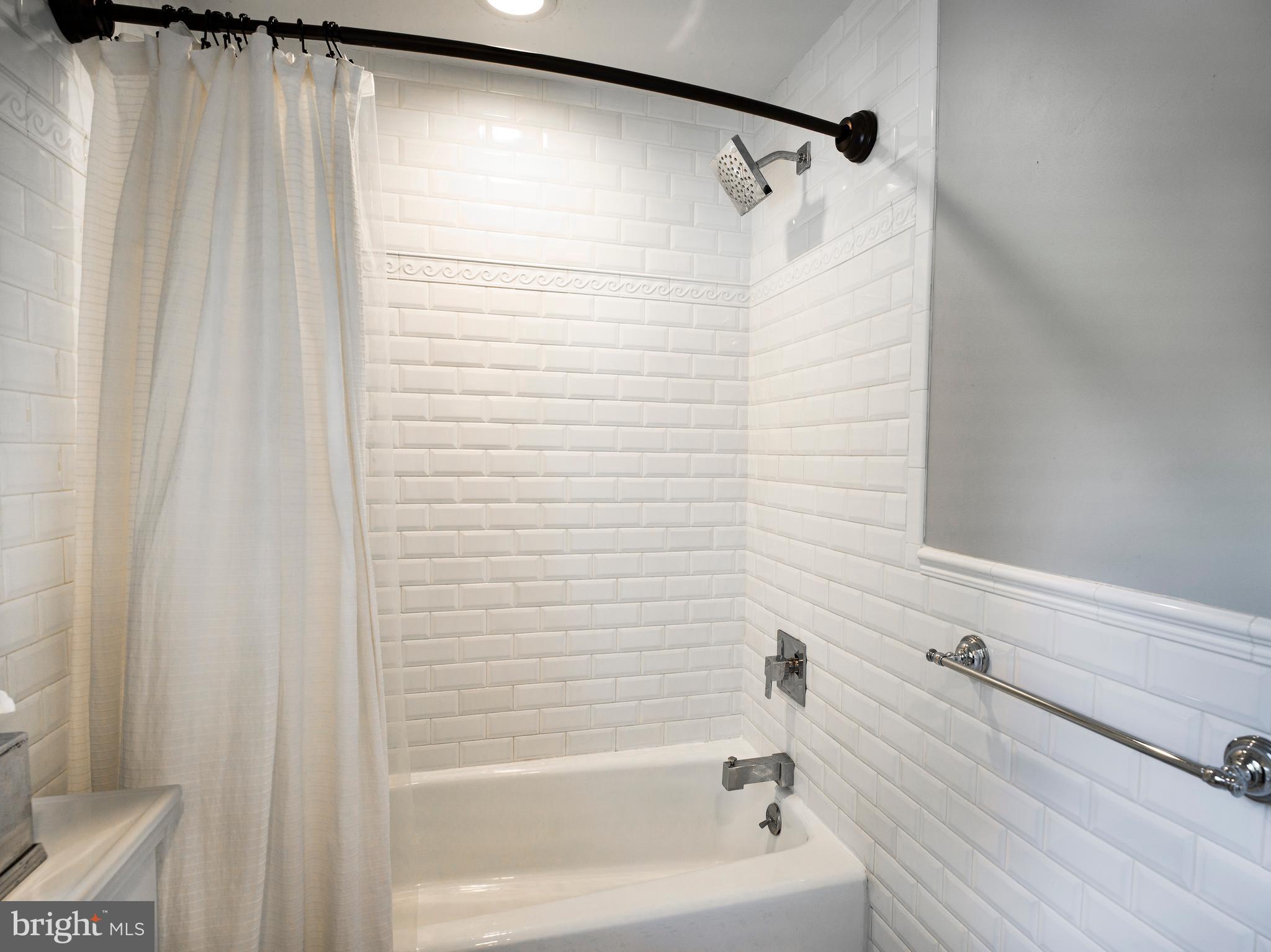 813 Hunt Road Newtown Square, PA 19073 - Photo 37 of 49 a bathroom with a shower and a bath tub