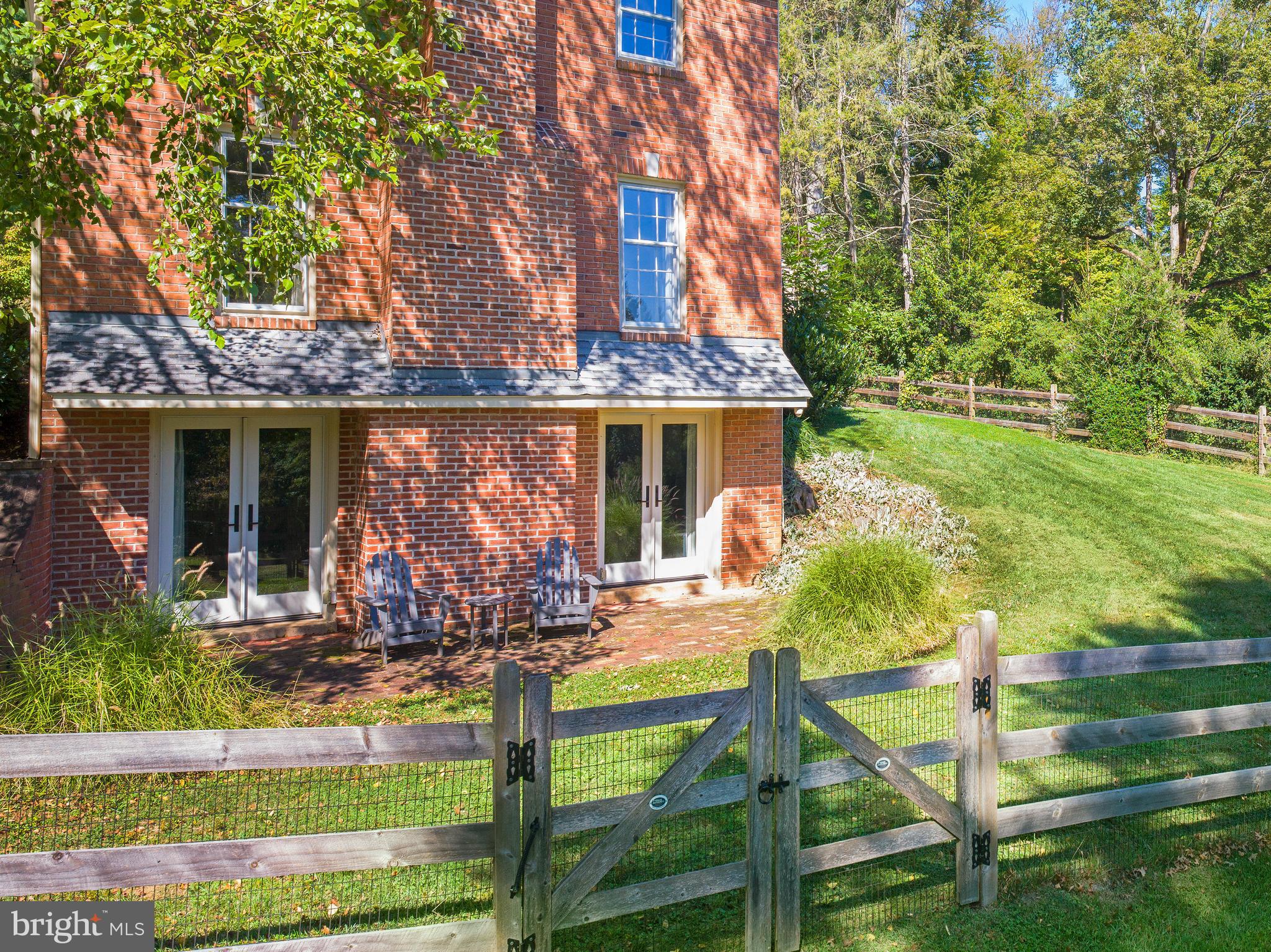 813 Hunt Road Newtown Square, PA 19073 - Photo 47 of 49 a front view of a house with garden