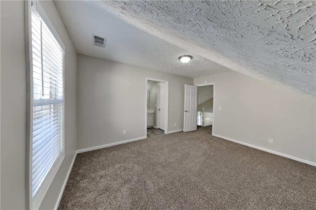 2097 Corsica Way Southwest Marietta, GA 30008 - Photo 16 of 25 an empty room with windows