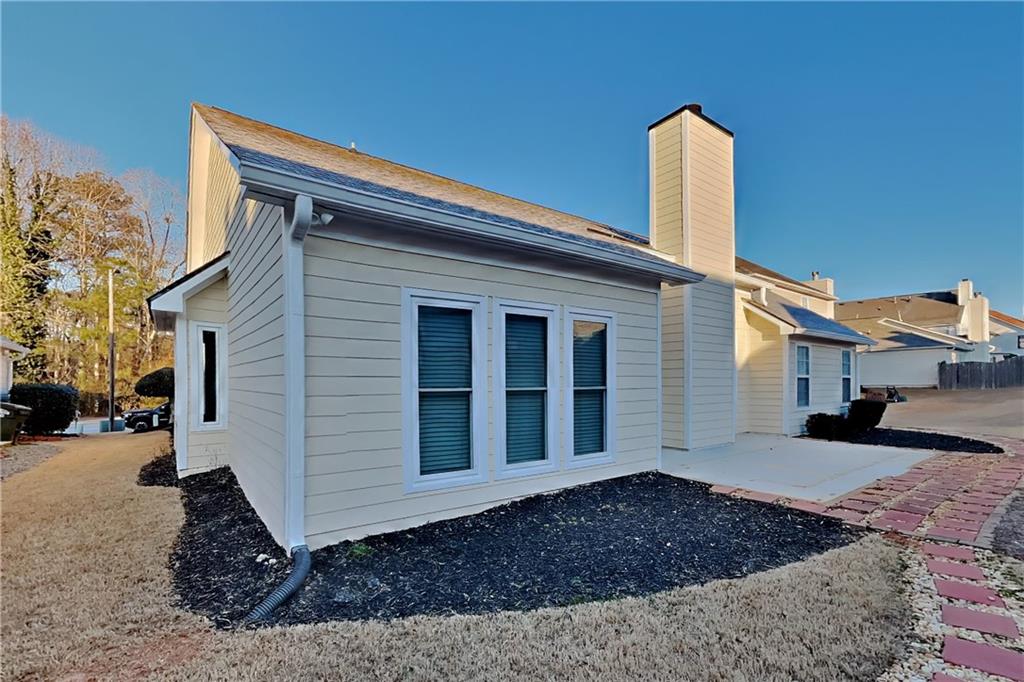 2097 Corsica Way Southwest Marietta, GA 30008 - Photo 22 of 25 a house view with a backyard