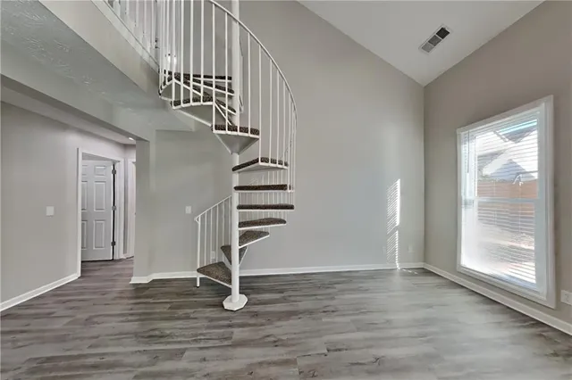 a view of entryway with wooden floor