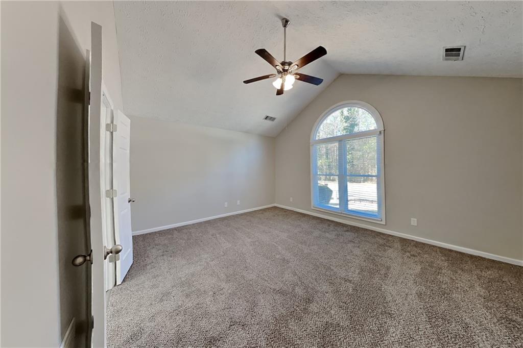 2097 Corsica Way Southwest Marietta, GA 30008 - Photo 8 of 25 a view of an empty room with a window