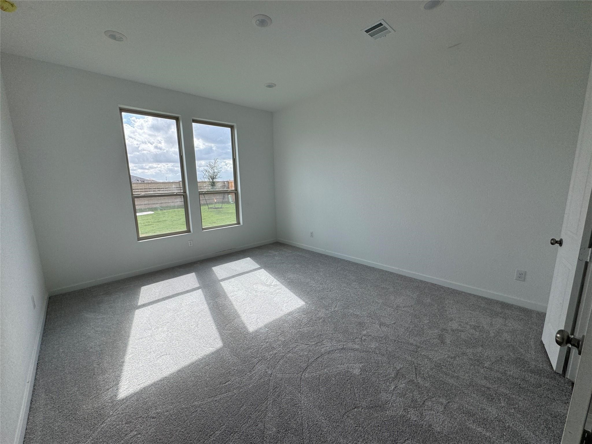 4211 Eagle Pass Drive Rosharon, TX 77583 - Photo 10 of 13 an empty room with windows