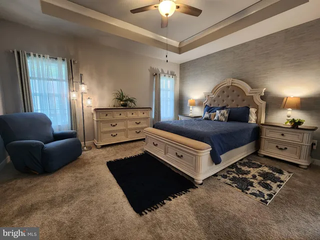 a bedroom with a bed and furniture