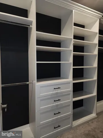 a bathroom with a double vanity sink mirror and