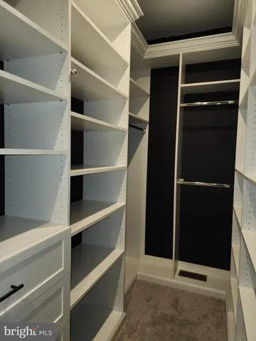 a living room with furniture window and a flat screen tv