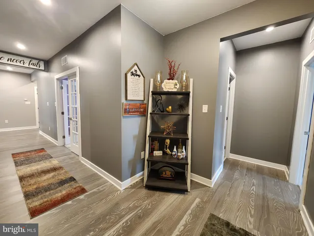 a backyard of a house with outdoor seating