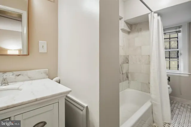 a view of a refrigerator in a room