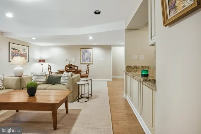 a living room with furniture and a table