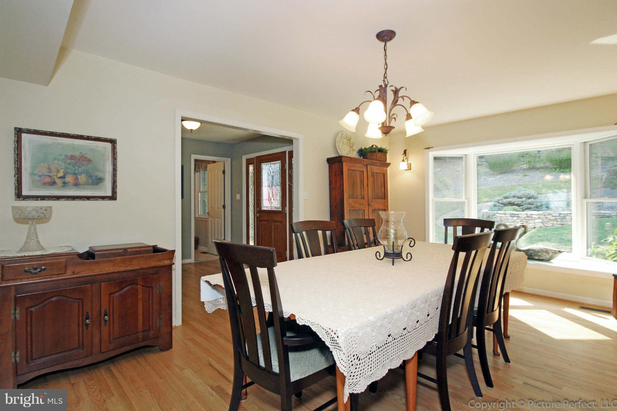 9831 Fox Road Frederick, MD 21702 - Photo 8 of 30 Dining Room Looking into the Foyer