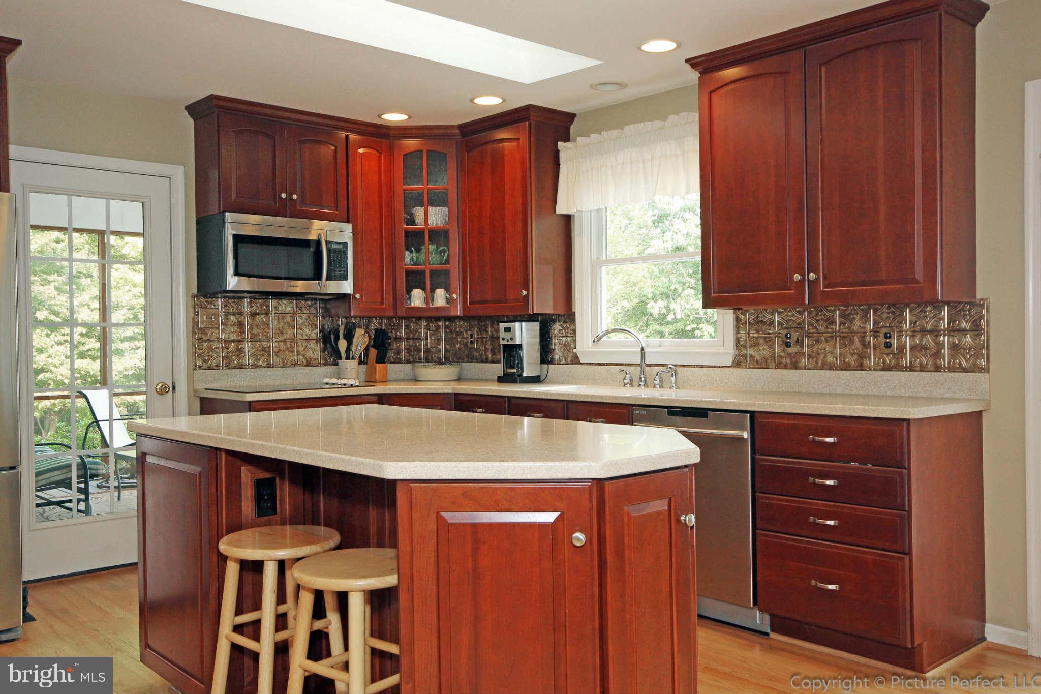 9831 Fox Road Frederick, MD 21702 - Photo 9 of 30 Island Close-Up with Door to Screened Porch