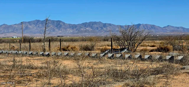 a view of a lake with mountains in the background