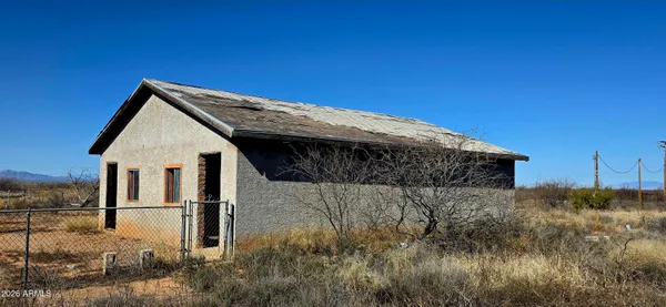 a view of balcony with wooden floor