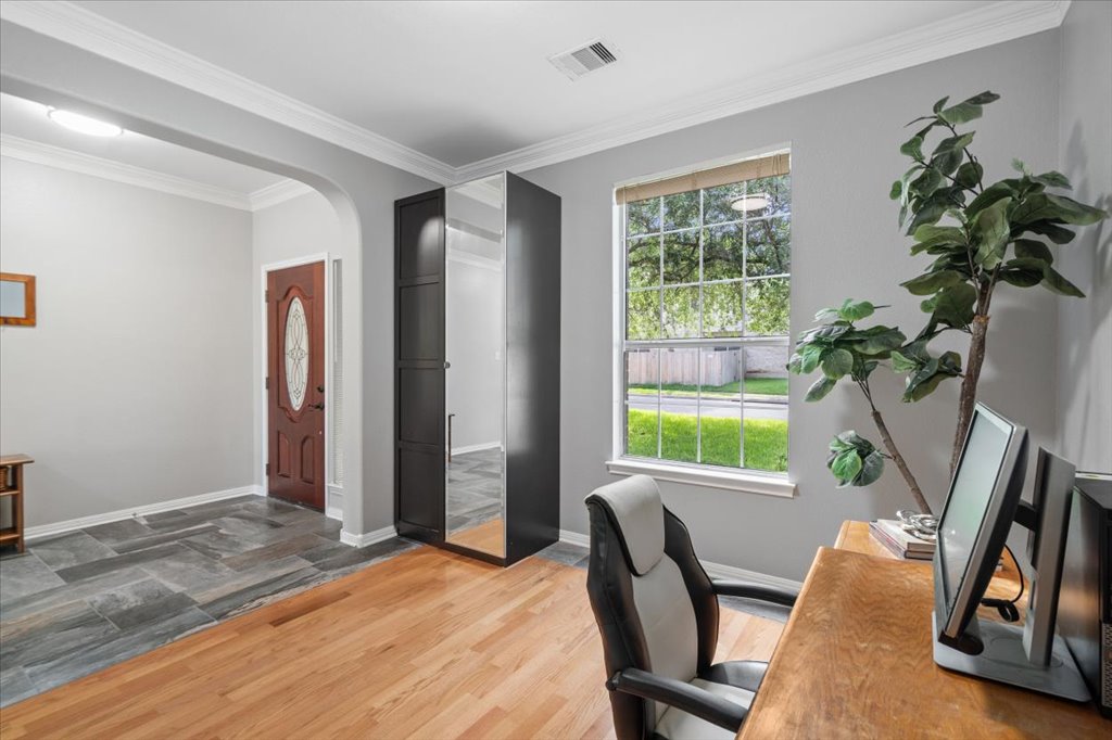 10801 Beachmont Lane Austin, TX 78739 - Photo 20 of 40 Just off the front entry is the perfect space for your home office, tucked away from the rest of the home to offer you privacy and solitude. This space can also be used as a formal dining room or even a music room!