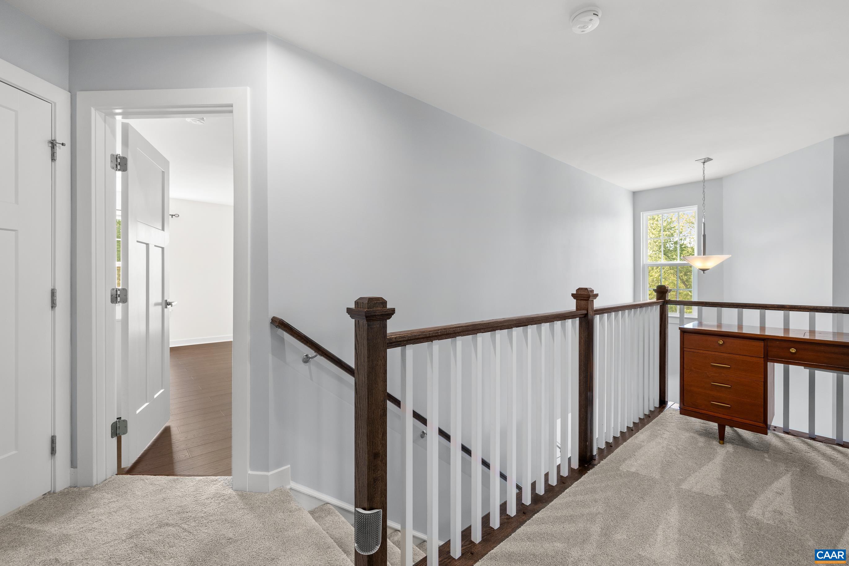 4286 Sunset Drive Charlottesville, VA 22911 - Photo 21 of 43 a view of a hallway with a livingroom and stairs
