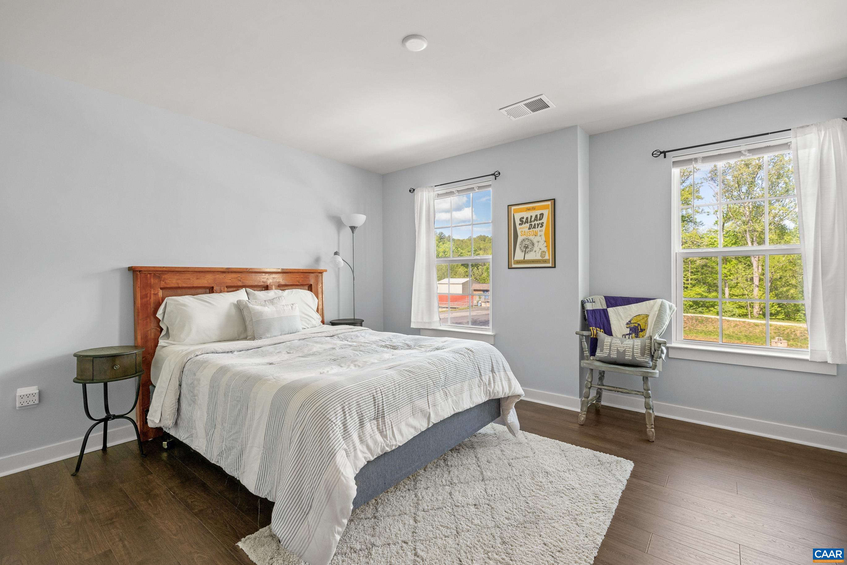 4286 Sunset Drive Charlottesville, VA 22911 - Photo 28 of 43 a bedroom with a bed chair and window
