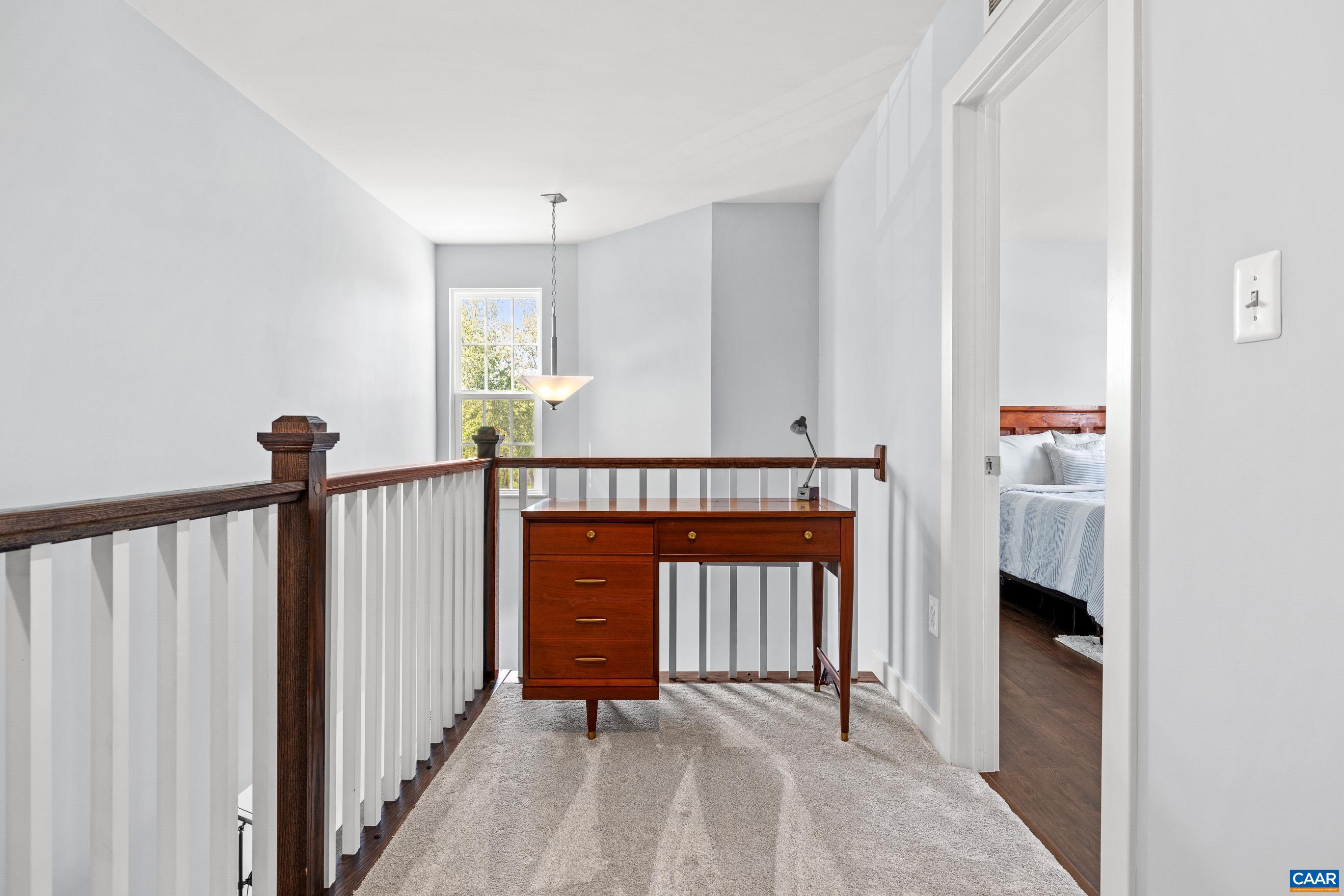 4286 Sunset Drive Charlottesville, VA 22911 - Photo 30 of 43 a front view of a house with a hallway