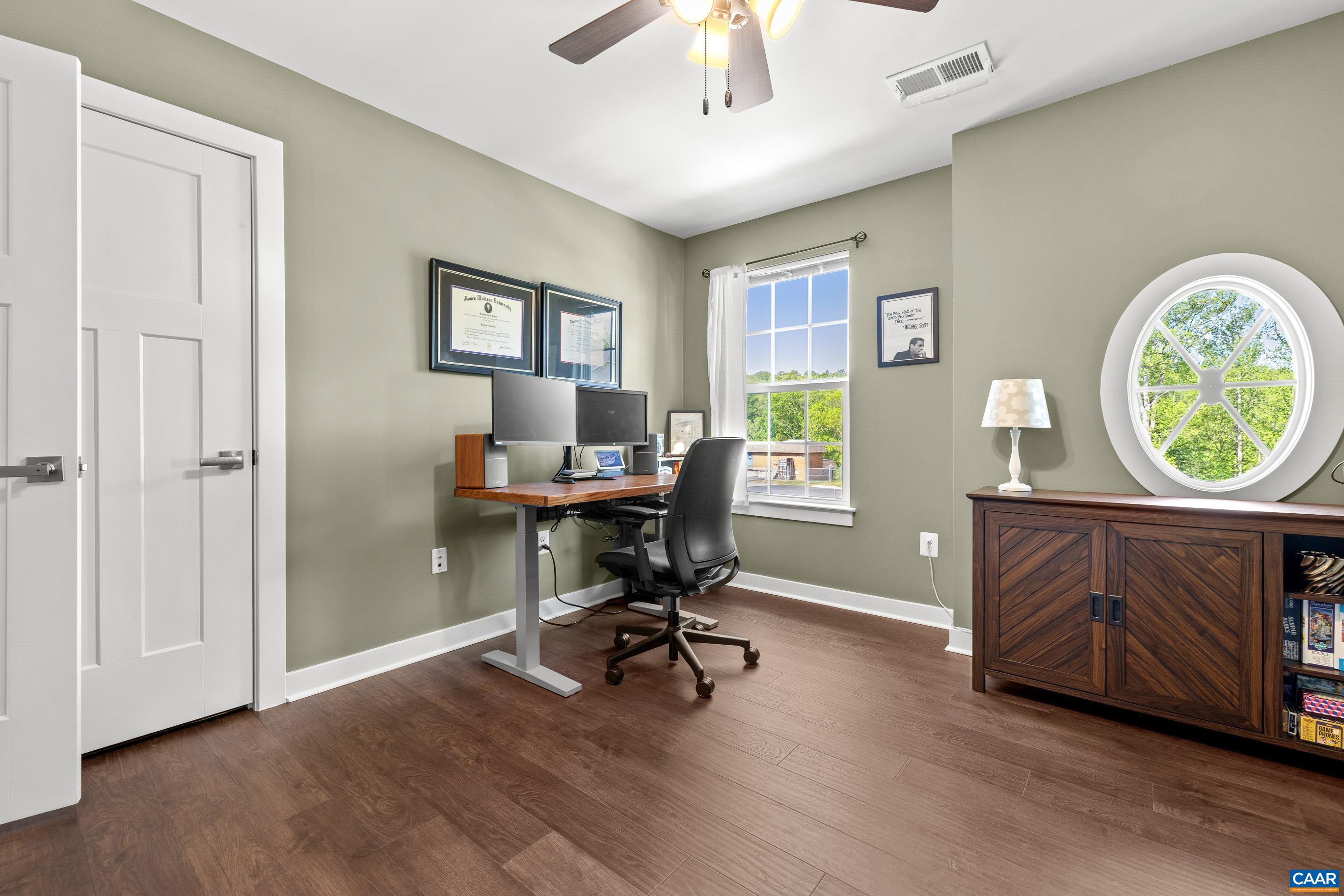 4286 Sunset Drive Charlottesville, VA 22911 - Photo 32 of 43 a view of a workspace with furniture and a window