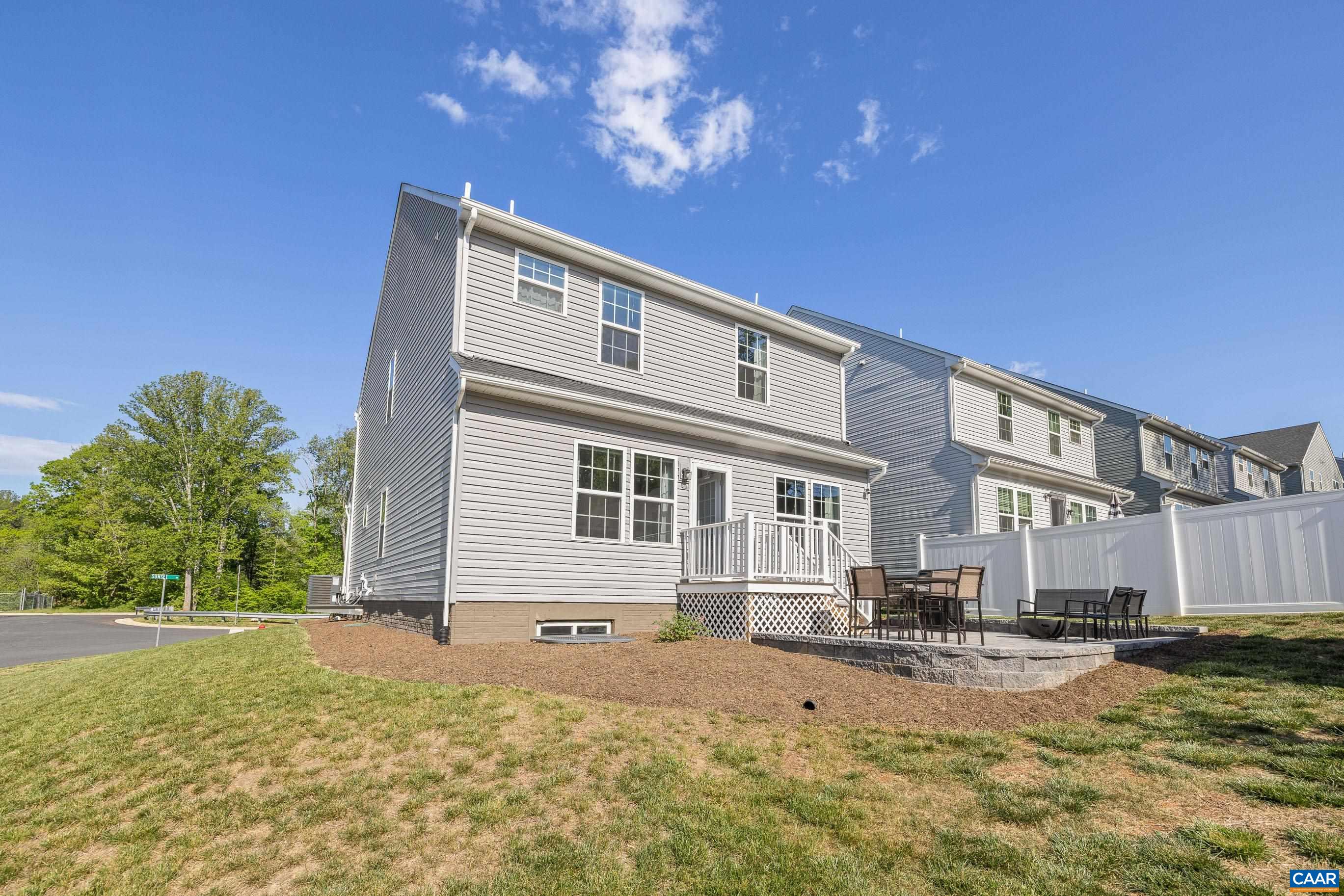 4286 Sunset Drive Charlottesville, VA 22911 - Photo 40 of 43 a front view of a house with a yard