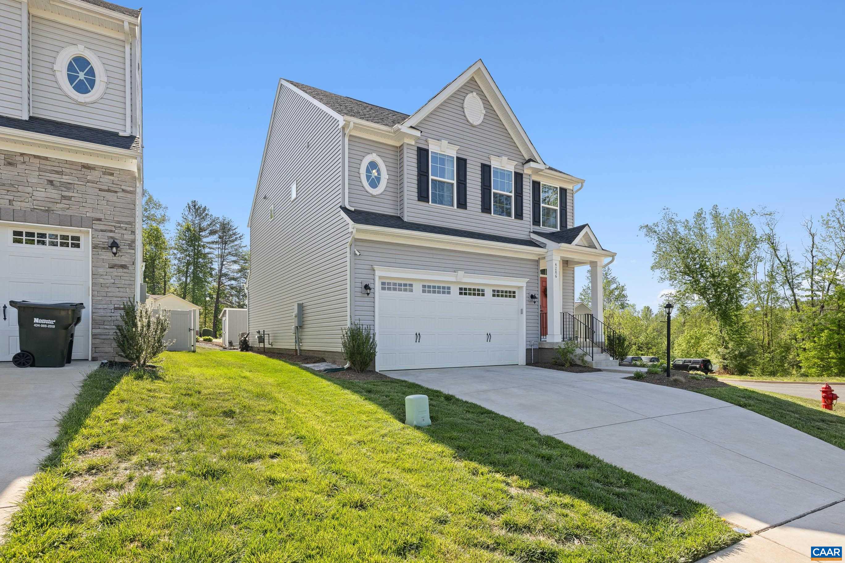 4286 Sunset Drive Charlottesville, VA 22911 - Photo 42 of 43 a front view of a house with a yard