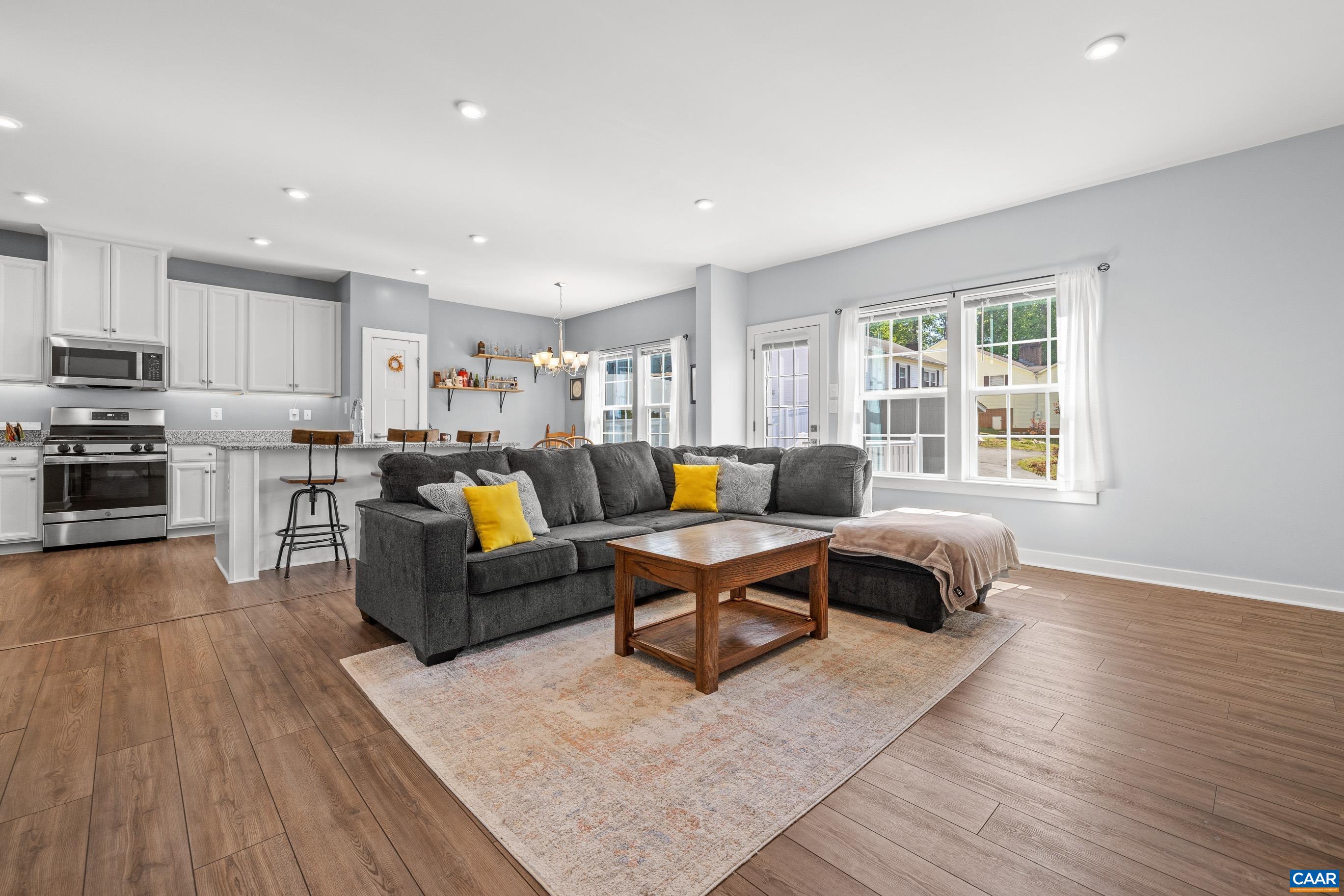 4286 Sunset Drive Charlottesville, VA 22911 - Photo 9 of 43 a living room with furniture and wooden floor