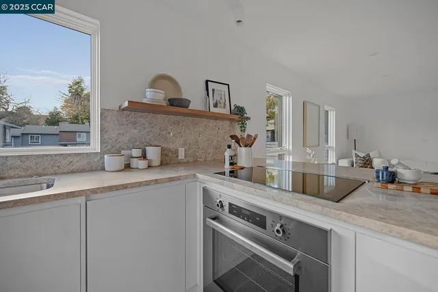 a bathroom with a sink a vanity and a mirror