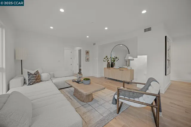 a kitchen with a sink cabinets and outdoor space