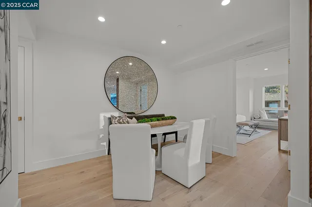 a bedroom with a bed and a mirror