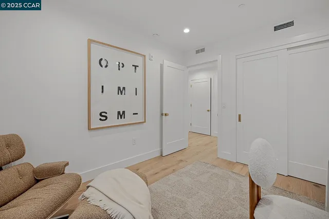 a bed room with a bed and a couch