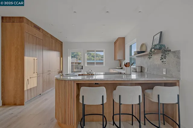 a bathroom with a sink and a window
