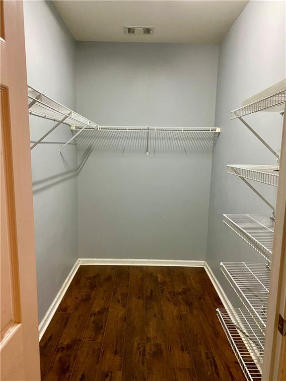 1428 Orchard Park Drive Stone Mountain, GA 30083 - Photo 11 of 19 a view of a room with racks on the wall