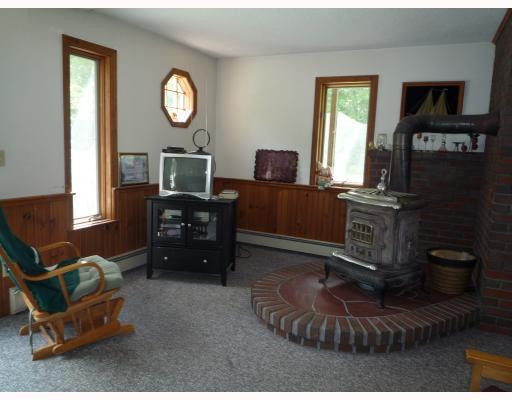 134 Chaplin Mills Road Naples, ME 04055 - Photo 5 of 8 Living Room. Woodstove excluded