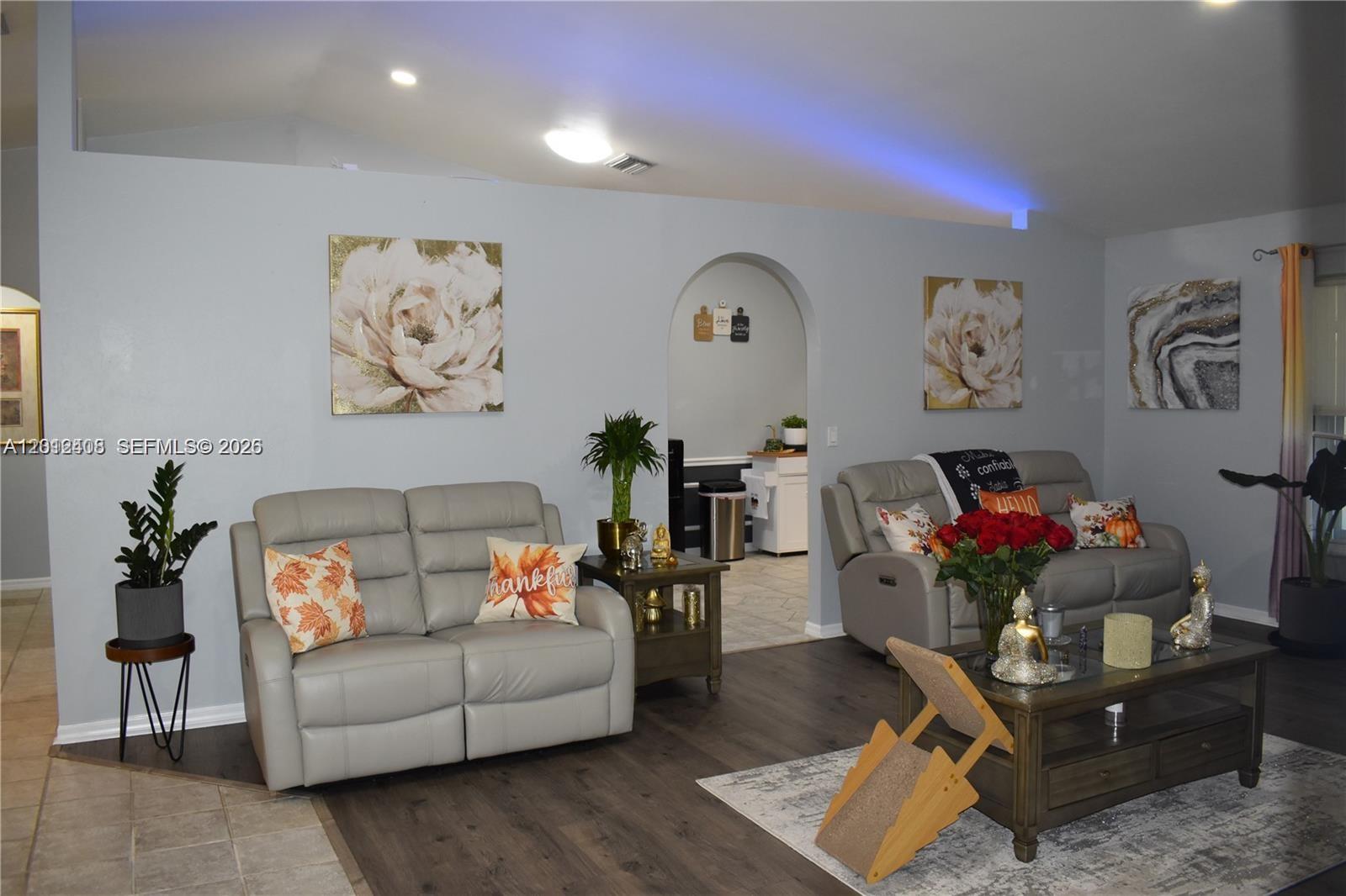 15639 Spring Line Lane Fort Myers, FL 33905 - Photo 4 of 14 a living room with furniture and wooden floor