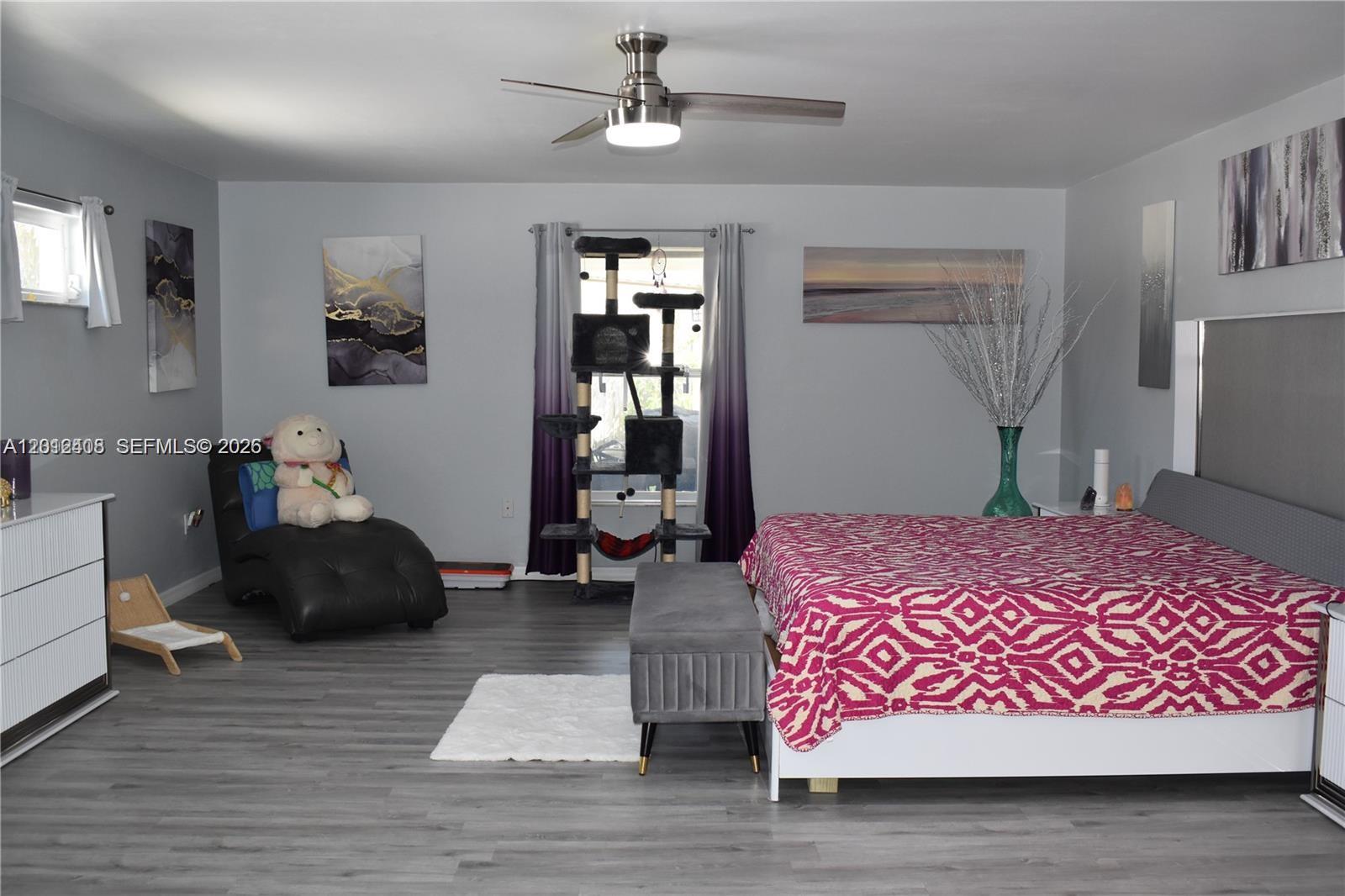 15639 Spring Line Lane Fort Myers, FL 33905 - Photo 7 of 14 a bedroom with a bed dresser and a window