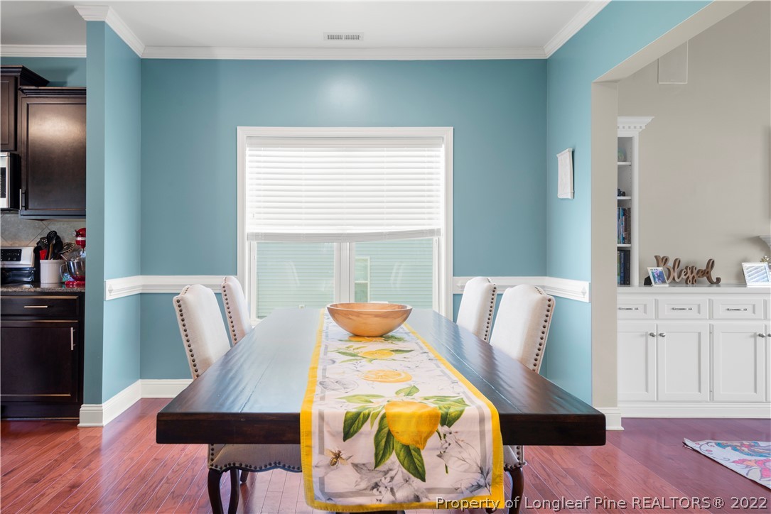 207 Samuel Nicholas Drive Cameron, NC 28326 - Photo 12 of 31 a bed room with furniture and a window