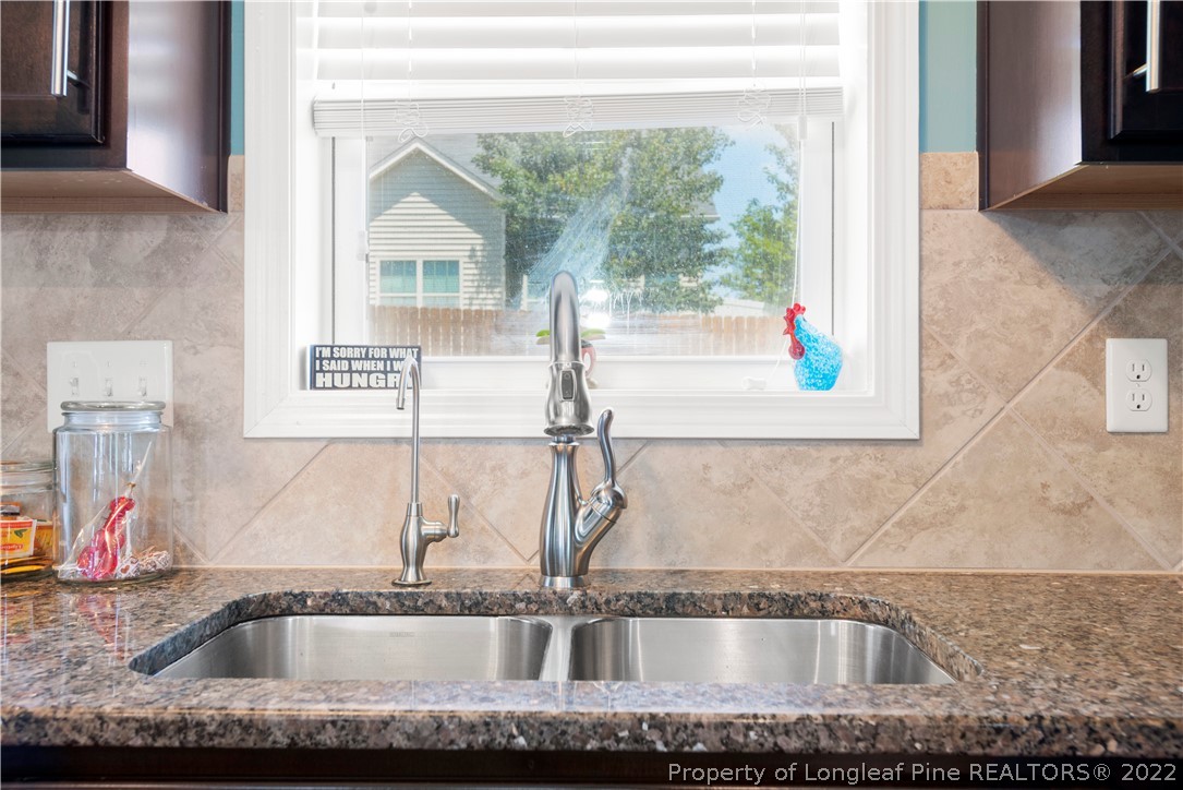 207 Samuel Nicholas Drive Cameron, NC 28326 - Photo 16 of 31 a close view of sink and tap