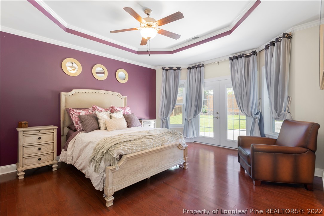 207 Samuel Nicholas Drive Cameron, NC 28326 - Photo 18 of 31 a bedroom with a bed and a couch