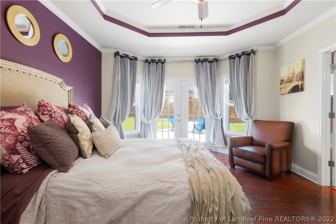 207 Samuel Nicholas Drive Cameron, NC 28326 - Photo 19 of 31 a bedroom with a bed and a couch
