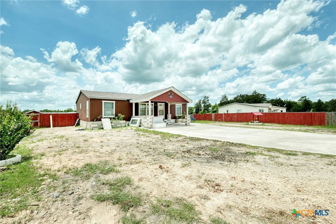 181 Pasadera Drive Elgin, TX 78621 - Photo 4 of 33 a front view of house with yard