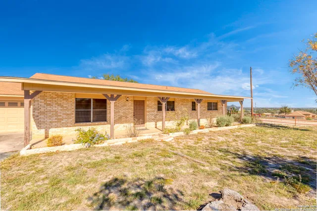 a bathroom with a sink and a large mirror