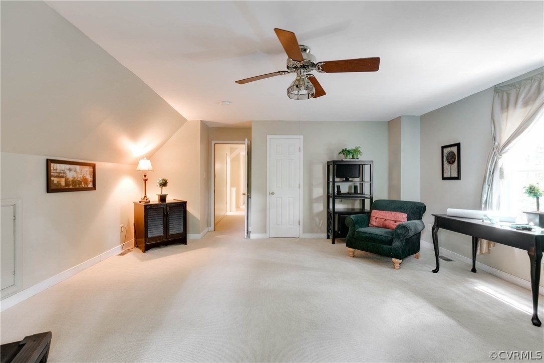 5302 Chestnut Bluff Road Midlothian, VA 23112 - Photo 48 of 50 a view of a livingroom with furniture and a ceiling fan