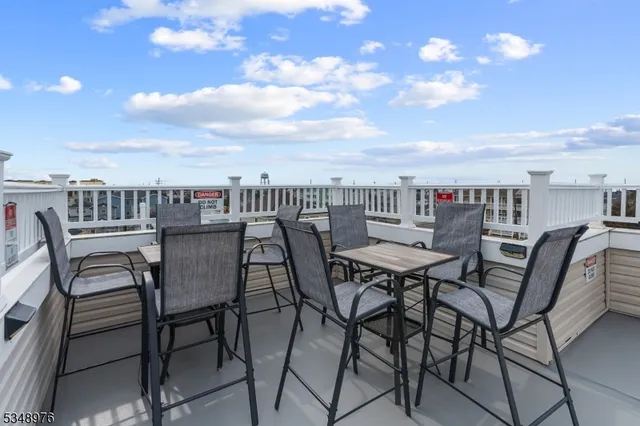 a view of a terrace with furniture